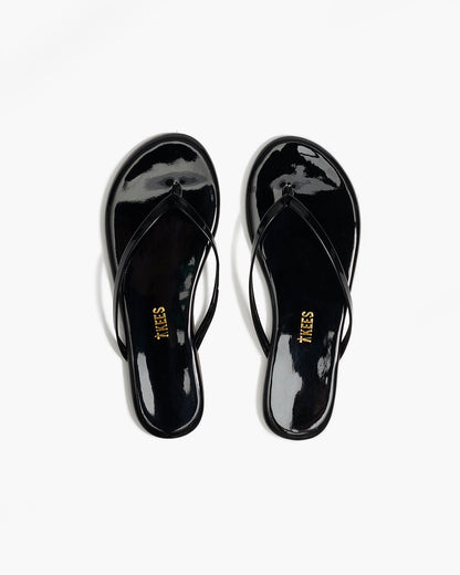 Lily Glosses Leather Flip Flops in Licorice - TKEES