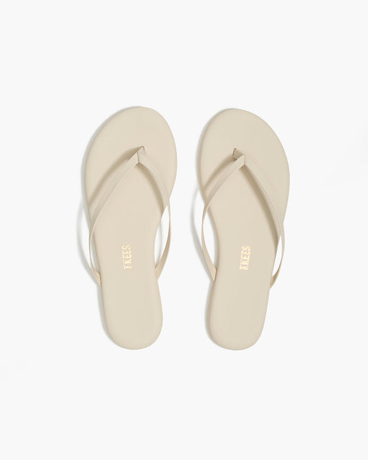 Lily Pigments Leather Flip Flops in Cream - TKEES
