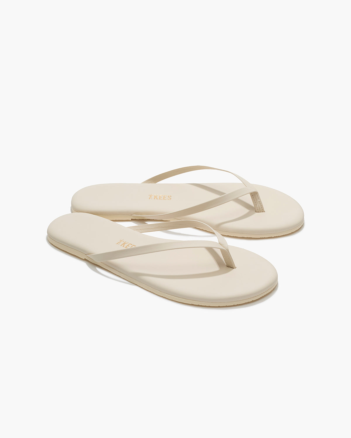 Lily Pigments Leather Flip Flops in Cream - TKEES