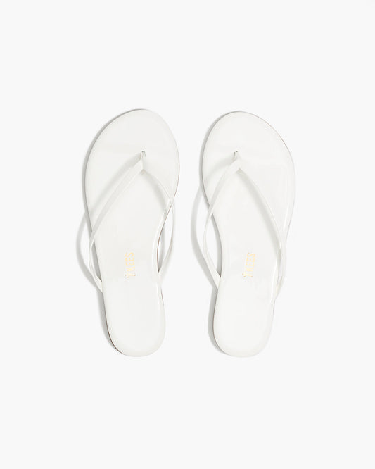 Lily Glosses Leather Flip Flops in White Lotus - TKEES