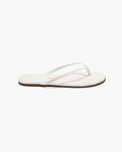 Lily Glosses Leather Flip Flops in White Lotus - TKEES