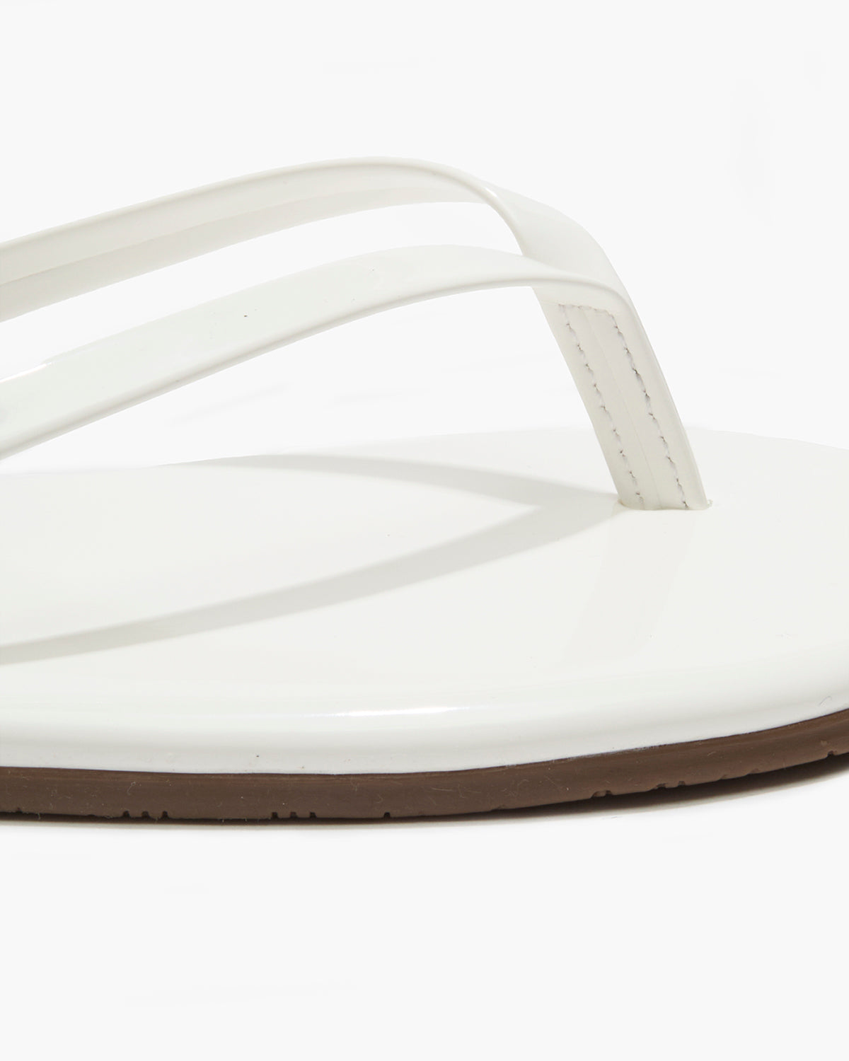 Lily Glosses Leather Flip Flops in White Lotus - TKEES