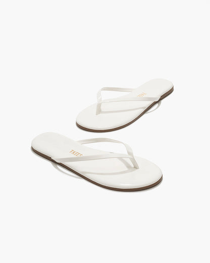 Lily Glosses Leather Flip Flops in White Lotus - TKEES