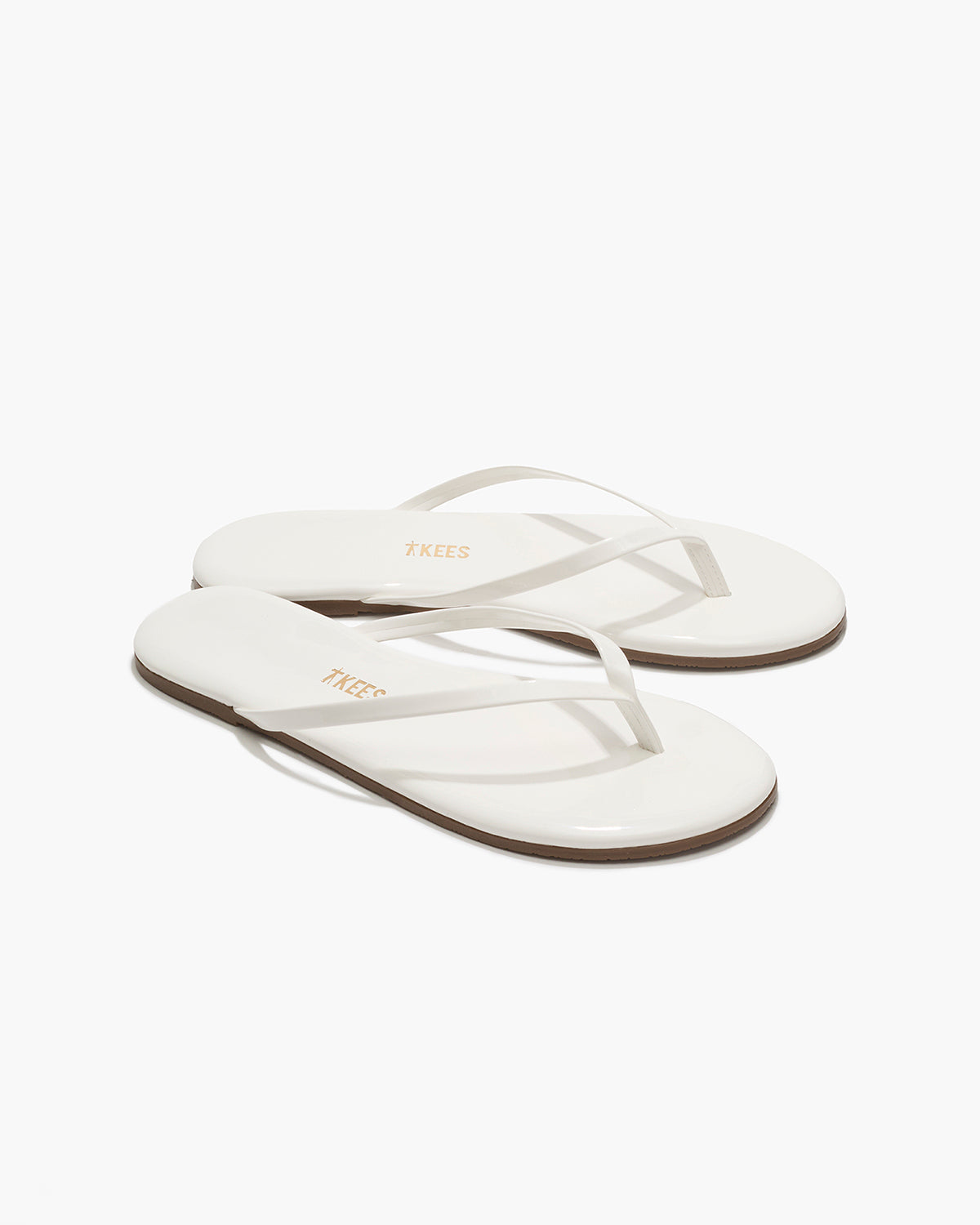 Lily Glosses Leather Flip Flops in White Lotus - TKEES