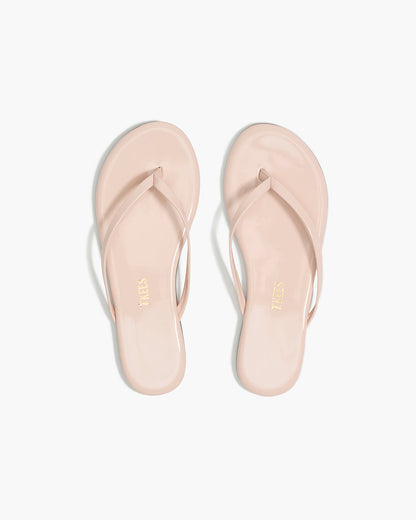 Lily Glosses Leather Flip Flops in Whipped Cream - TKEES