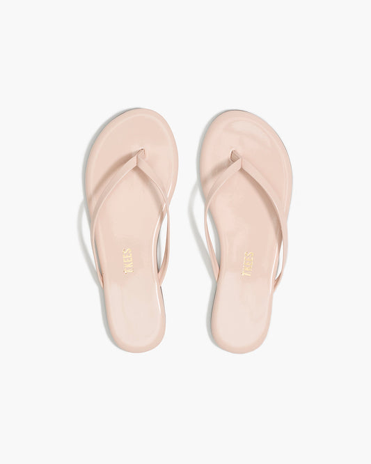 Lily Glosses Leather Flip Flops in Whipped Cream - TKEES