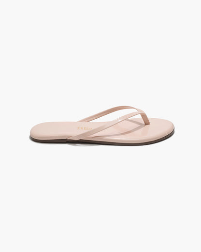 Lily Glosses Leather Flip Flops in Whipped Cream - TKEES