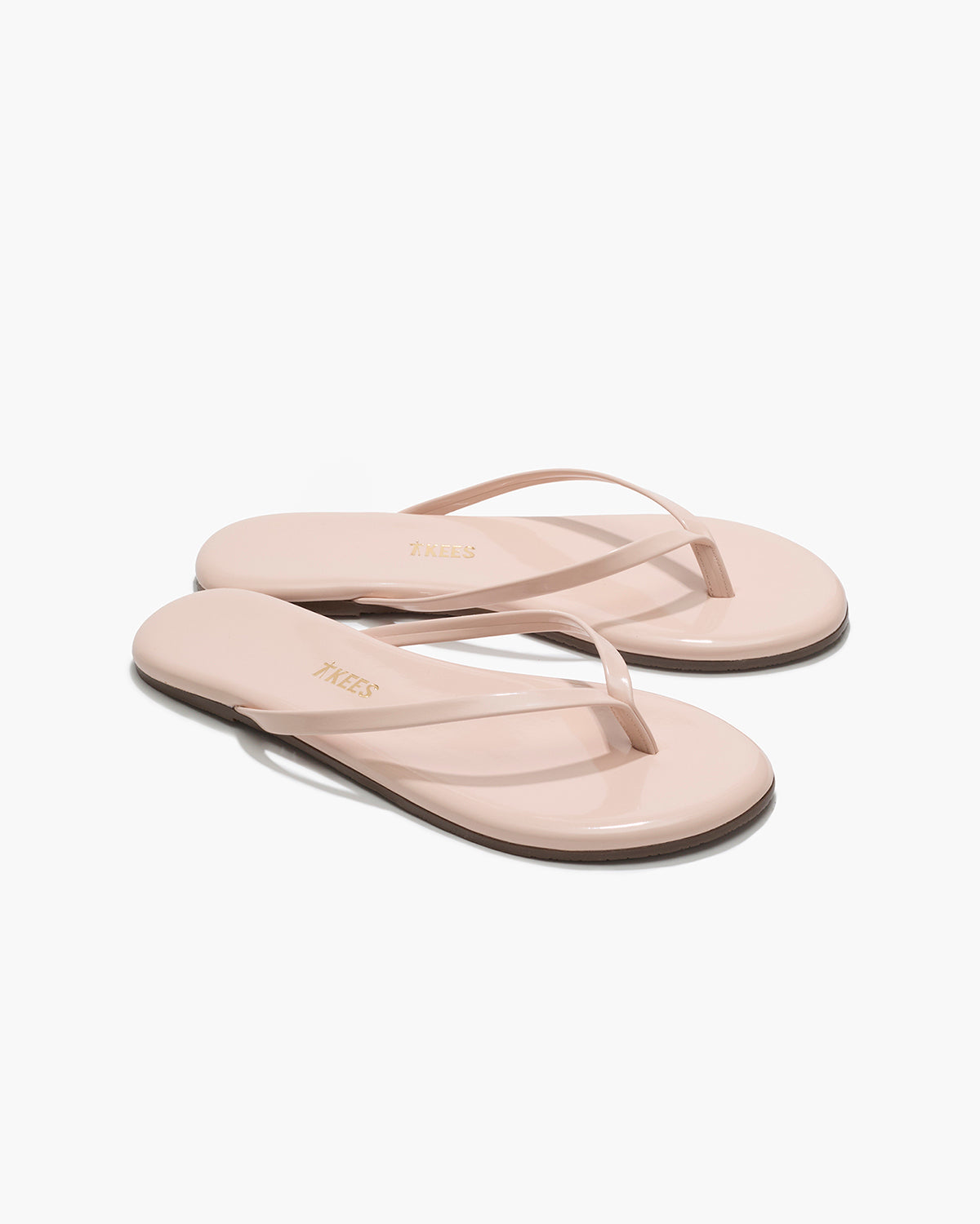 Lily Glosses Leather Flip Flops in Whipped Cream - TKEES
