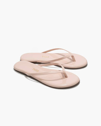 Lily Glosses Leather Flip Flops in Whipped Cream - TKEES