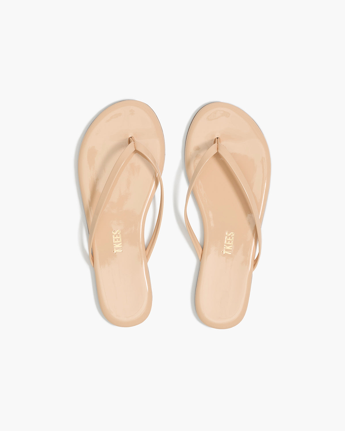 Lily Glosses Leather Flip Flops in Linen - TKEES