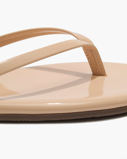 Lily Glosses Leather Flip Flops in Linen - TKEES