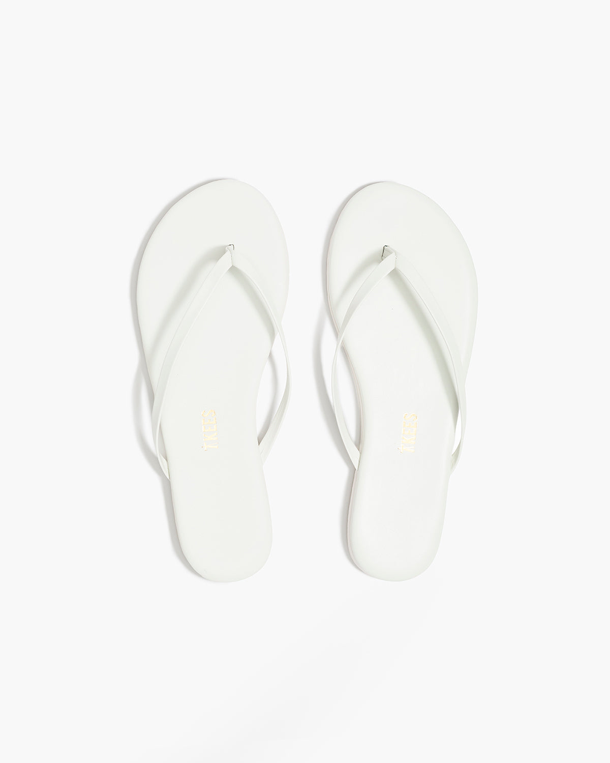 Lily Pigments Leather Flip Flops in White - TKEES