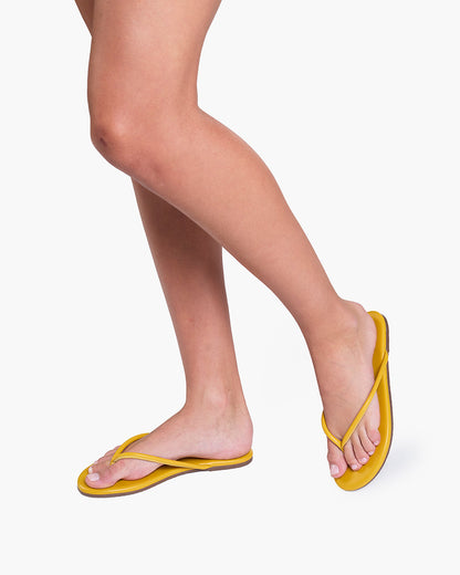 Tubular Lily Lemon Curry Flip Flops  - TKEES